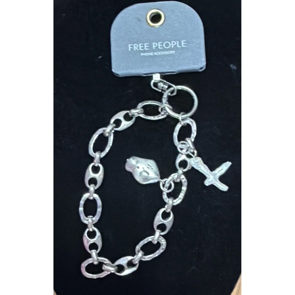 NWT Free People Silver Tone Chunky Charmed Phone Wristlet